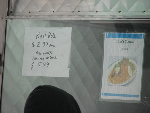 Kati roll and biryani signs