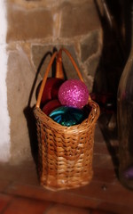 Basket of baubles in the fireplace