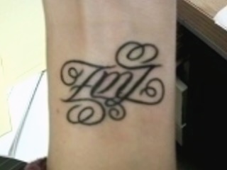 "EMZ" & "RAZ" Ambigram Tattoo