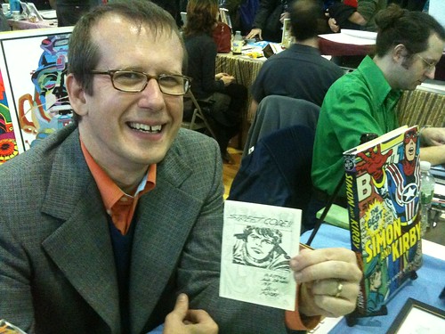 Rand Hoppe of the Jack Kirby Museum holding a very important comic: "Street Code"!