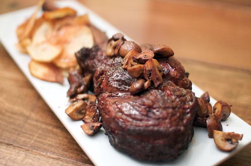 Tomahawk steak with mushrooms and potatoes