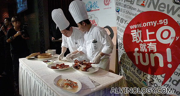 The chefs skillfully skinning the Peking Ducks on-the-spot