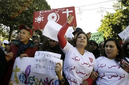 Demonstration of thousands demanding the formation of a secular political system in the North African state of Tunisia. A priest was killed recently prompting condemnation throughout the country. The people want popular rule immediately. by Pan-African News Wire File Photos