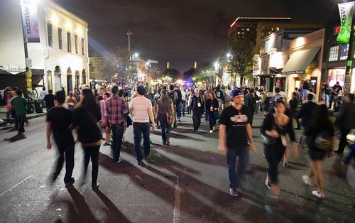 Sixth Street in downtown Austin is filled with pedestrians during the SXSW music festival 