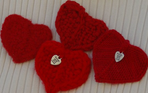 4 hearts 2 patons classic wool 1 felted 1 unfelted  then 1 red heart doubled then 1 fingering yarn