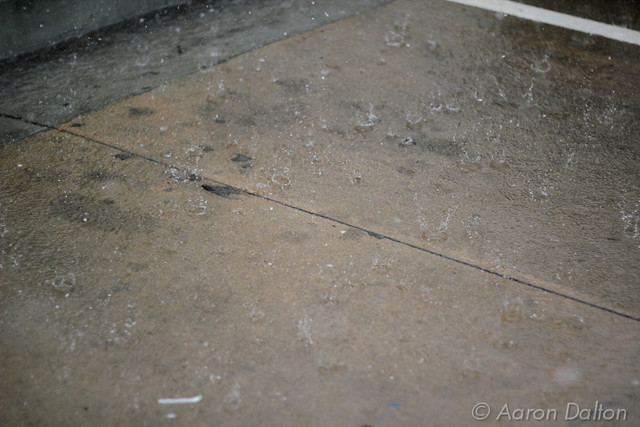 Sidewalk Bombarded with Rain
