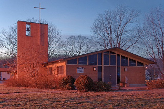 Mary Queen of Peace Catholic Mission, in Clarksville, Missouri, USA - exterior at sunset