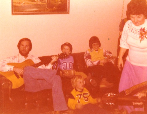 Dad Playing Guitar on Other Couch