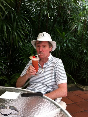 Yours truly enjoys his Singapore Sling at Raffles Hotel by opticmerv
