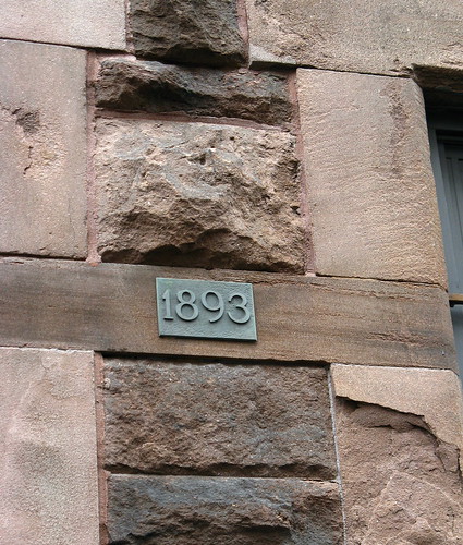 1893 Sign on Former Stable Building