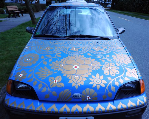 Custom painted art car decorated in a gold and white floral motif, Broadview, Seattle, Washington, USA by Wonderlane
