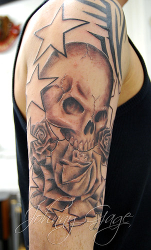 skull roses stars and tribal tattoo Photo by johnny gage