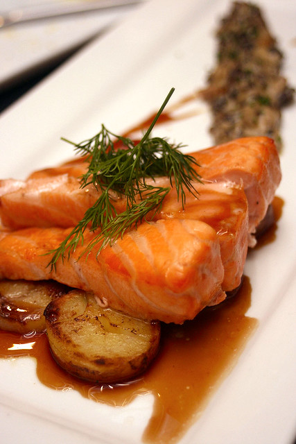 Signature House-smoked Salmon with stewed morels, fingerling potatoes and dark dill sauce