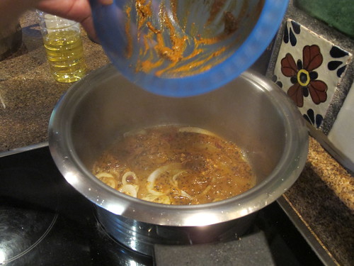 Adding the spice paste