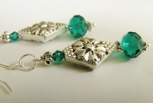 http://www.etsy.com/listing/73603002/dangling-turquoise-blue-crystal-earrings by mSs Distinctive Designs Studio