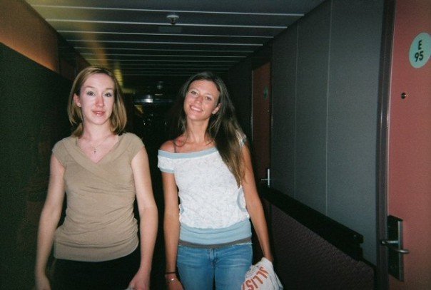 Lindsey randomly taking our picture while walking backwards down the ships hallway.