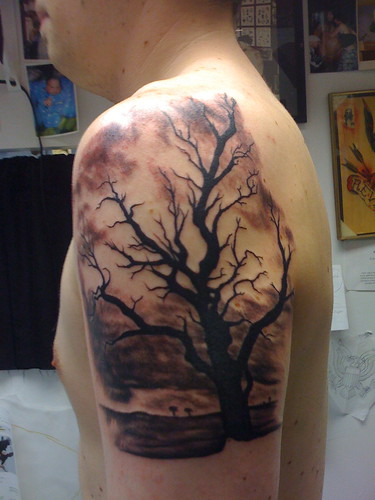 tree silhouette tattoo. tree silhouette