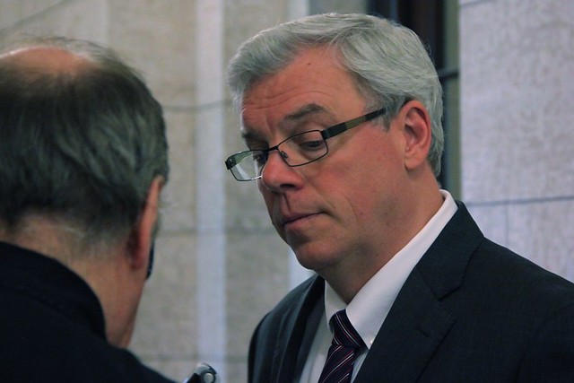 While walking through the Manitoba Legislative Assembly, I walked passed Premier Greg Selinger, who was in the midst of a media scrum with a group of local reporters.