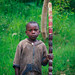 Kid with bamboo stick
