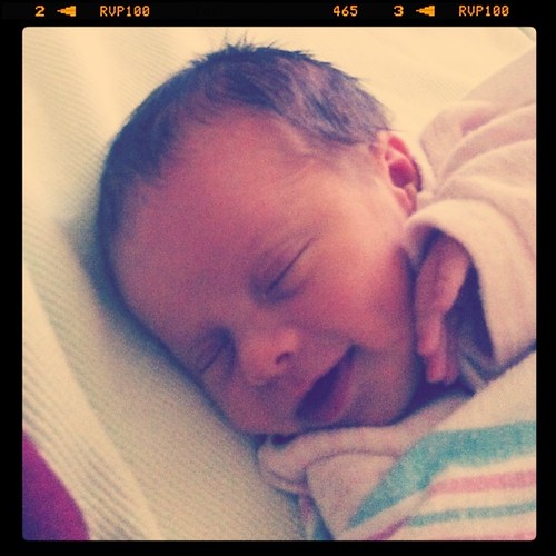 2 days old & smiling. Lucy is clearly a genius.