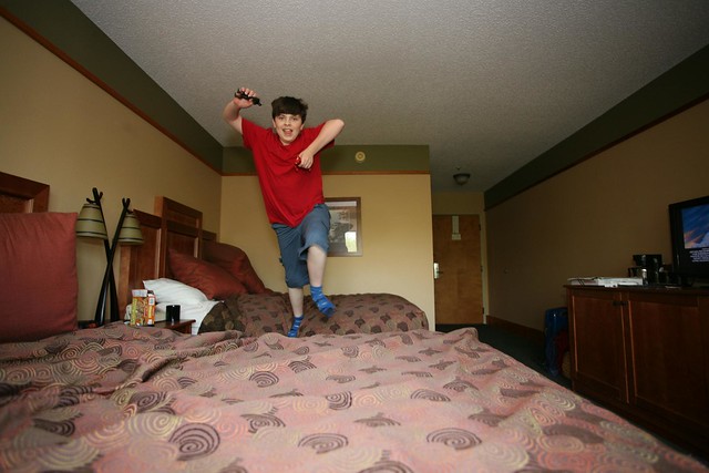 hotel bed jumping shots