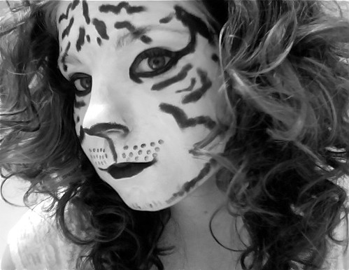 white tiger face. A girl with a white tiger face