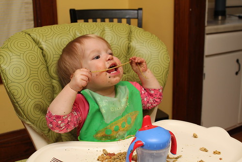 Annie eating pesto pasta