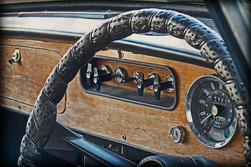 Dashboard of an old car dashboard old car steeringwheel wood textured 