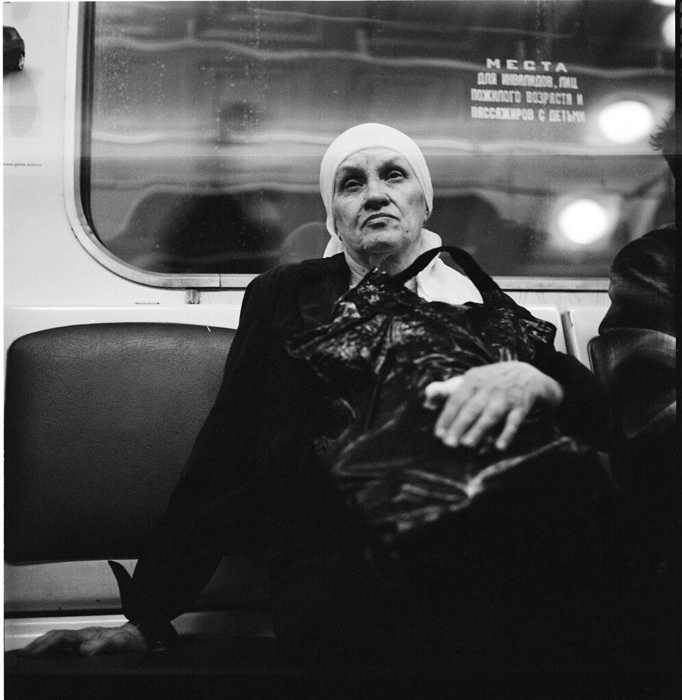 : Old woman in metro