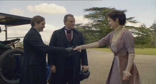 The duke and countess shake hands
