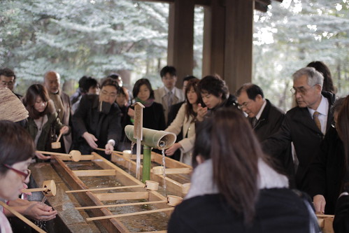 People washing hands at temizuya