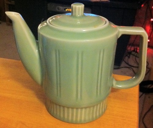 Green teapot lit