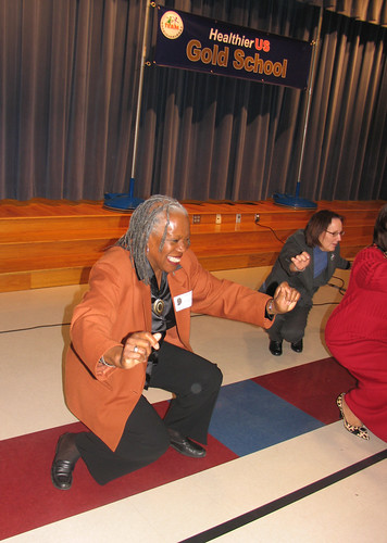 Deputy Administrator Audrey Rowe takes the dance challenge at Minshew Elementary School in McKinney, Texas. Students invited the adults to join them in some physical activity during the school assembly at the HealthierUS School Challenge gold award event. 