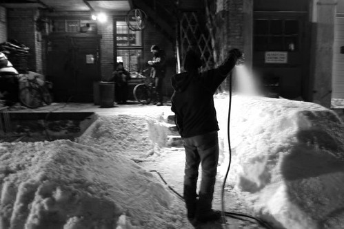 hosing down the snow berm