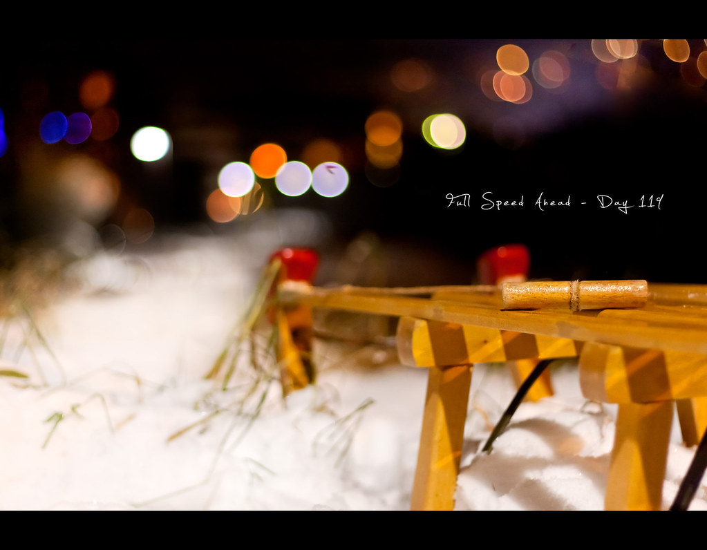 Day 119, 119/365, Project 365, Bokeh, snow, sled, project365, ourdailychallenge, full speed, ahead, full speed ahead, ambiente light, wood sled, snow, cold, fun, sledding, slide, 50mm, f1.8, a child's view,