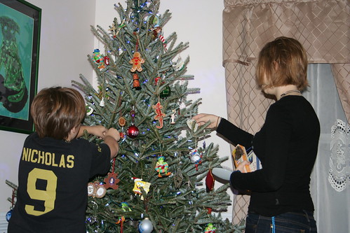 December 2010: Decorating the tree.