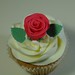 Classic vanilla cupcake with hand-modelled red rose topper