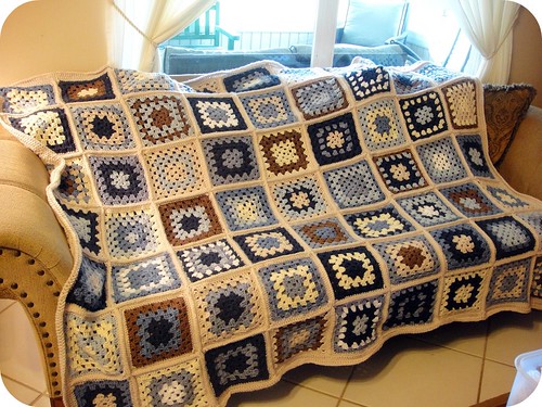 completed crocheted granny square afghan