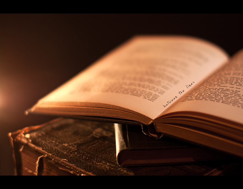 Day 162, 162/365, Project 365, Bokeh, Strobist, ourdailychallenge, ODC, Books, light, candle, candlelight, old books, old, leather, worn, text, old german, light, warm, library, 50mm, Sigma 50mm F1.4 EX DG HSM, leatherbound, binding