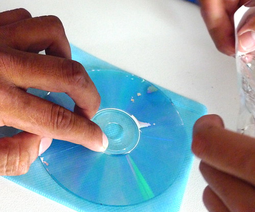 removing tops of CDs to keep cheap diffraction gratings