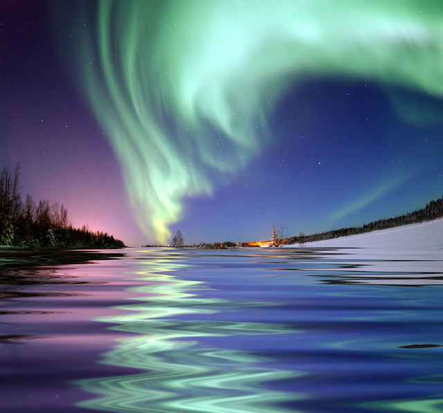 Aurora Borealis, the colored lights seen in the skies around the North Pole, the Northern Lights, from Bear Lake, Alaska