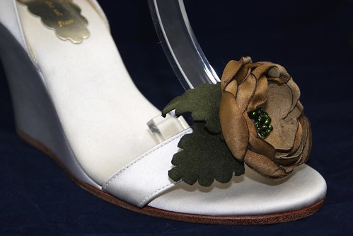 Our custom designed wedding wedges with a soft brown flower and green