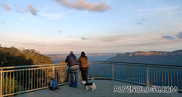 You can enjoy the sunset with a companion and a dog at the Three Sisters