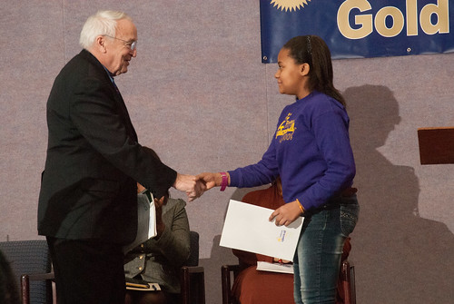 Agriculture Under Secretary for Food, Nutrition and Consumer Services Kevin W. Concannon was introduced by Storm Coley, Student Body President, Elsie Whitlow Stokes Community Freedom Public Charter School on Wednesday, February 2, 2011.  Under Secretary Concannon presented the first Gold Award of Distinction in Washington, D.C. to this school, a participant in the HealthierUS School Challenge (HUSSC).  They will now hold the certification and distinction for four years. The goal of the HUSSC is to improve the health of the Nation’s children by promoting healthier school environments. The challenge criteria include four major elements. (U.S. Department of Agriculture photo by Lance Cheung)
