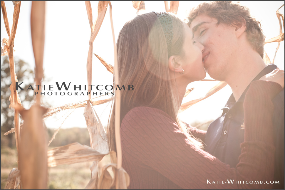 Katie.Whitcomb.Photographers_michelle.and.alex.kissing.in.the.cornfield