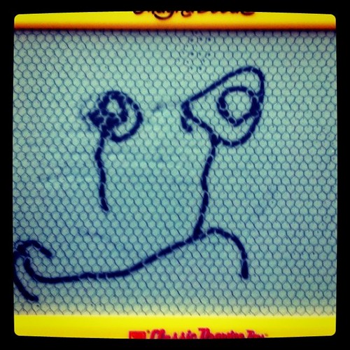 I asked Catie what this was. She said, "Mommy's sad face. See the tears?" Oh god.