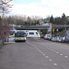 A southbound train crosses Flavel Street