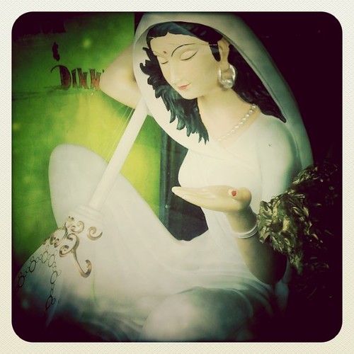 Lady in white with her sitar