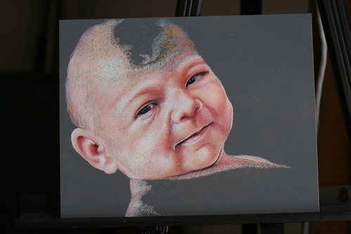 In progress colored pencil drawing of an infant, entitled Alexandra