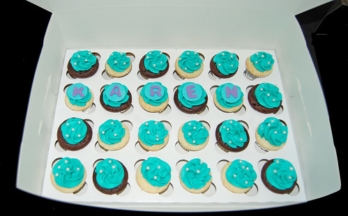 50 turquoise and purple mini cupcakes for a 50th birthday celebratrion